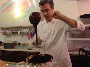 Pouring the chocolates into their molds.