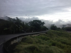 Bus rides through the clouds in the rainy season