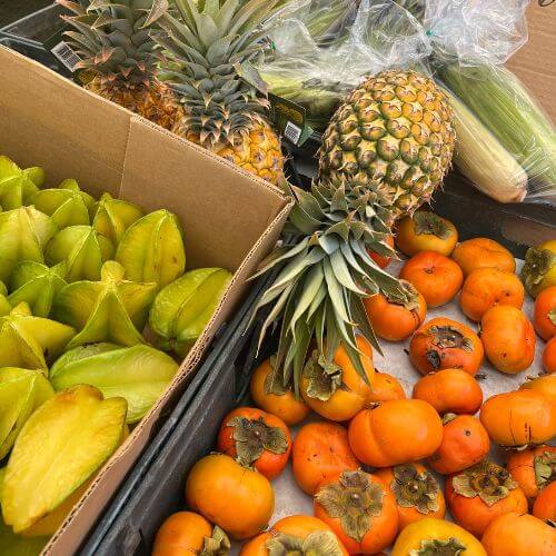 Fresh pineapple, star fruit and persimmons from Maui